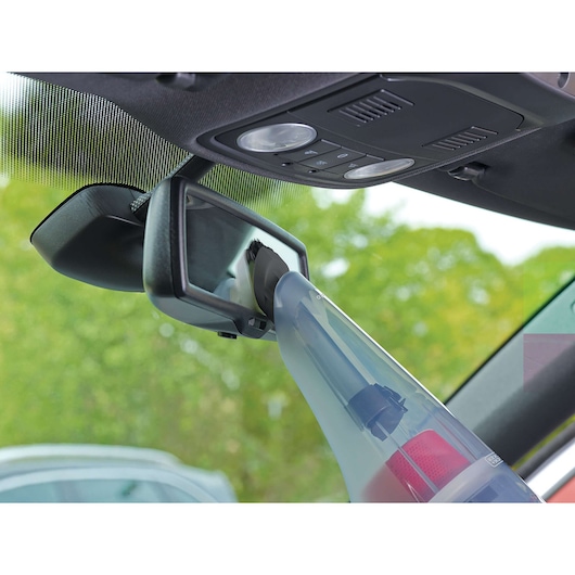 BLACKDECKER BDCV370-LA handheld vacuum cleaning car rearview mirror with brush attachment.
